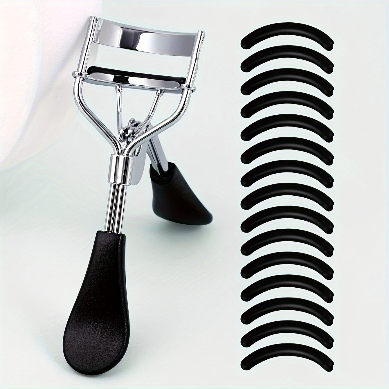 Portable Eyelash Curler (15 Silicone Pads), Stainless Steel Curved Handle, Curl & Shape, No Damage, Suitable for Women.