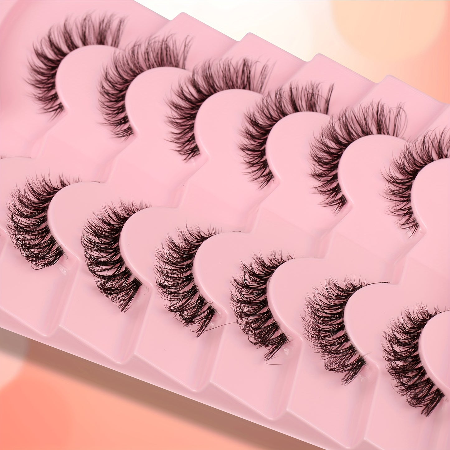 7 Pairs of Faux Mink Cat Eye Eyelashes - Ultra-Soft, Thick, Curly Design with Transparent Stem for a Natural Look - 12mm Length, Ideal for Daily Wear and Romantic Dates