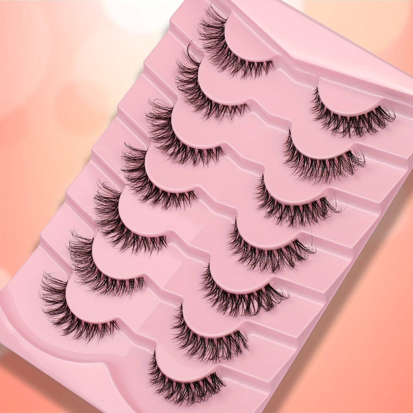 7 Pairs of Faux Mink Cat Eye Eyelashes - Ultra-Soft, Thick, Curly Design with Transparent Stem for a Natural Look - 12mm Length, Ideal for Daily Wear and Romantic Dates